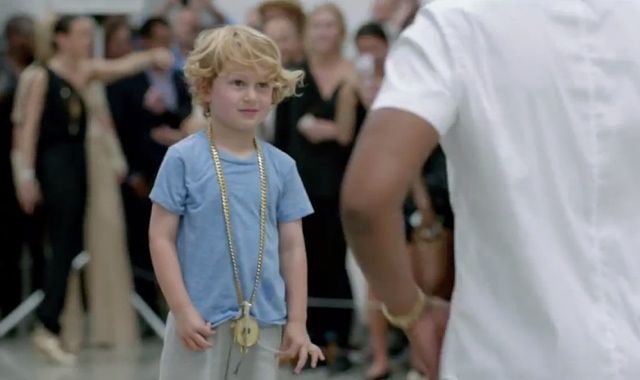 This little kid wears Jay Z's bling